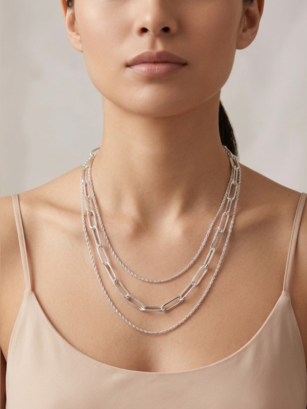 101. Bronze 3 layer convertible silver tone necklace